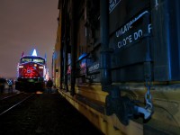 The 10th anniversary holiday train stops by Lambton Yard for the 18:30 show for all the spectators, meanwhile other spectators gather in front of the decked out locomotive to have their picture taken.