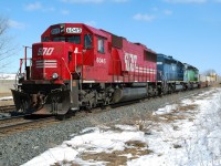 CP 241 with a colourful lashup sits on the main track at Nissouri awaiting a crew