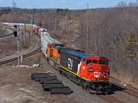 A clean C40-8M leads a ex BNSF pumpkin on train 332 at Bayview Jct. 