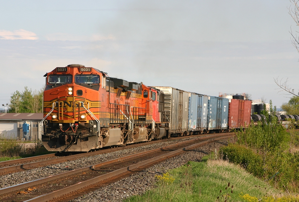 CN 392 grinds through the north end of Burlington with a BNSF leader