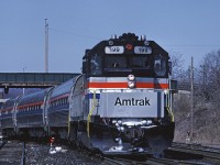 Amtrak GP40TC 199 leads the Maple Leaf away from its station stop in Hamilton enroute to New York City