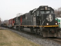 CN X392 rolls through Georgetown behind IC 1007 with 30 CWR loads for the NECR up front.
