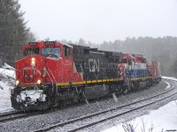 CN 2534+BCOL 743 about to knock down a clear signal at South Parry in the middle of an April blizzard. 