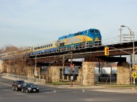 P42DC 904 leads VIA 87 over the streets of Guelph, the Speed River and the Guelph Junction Railway, in the downtown core.