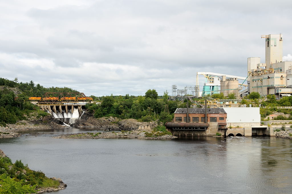 A renewed Huron Central lumbers over the Spanish River for the first time since it\'s near shutdown days earlier.