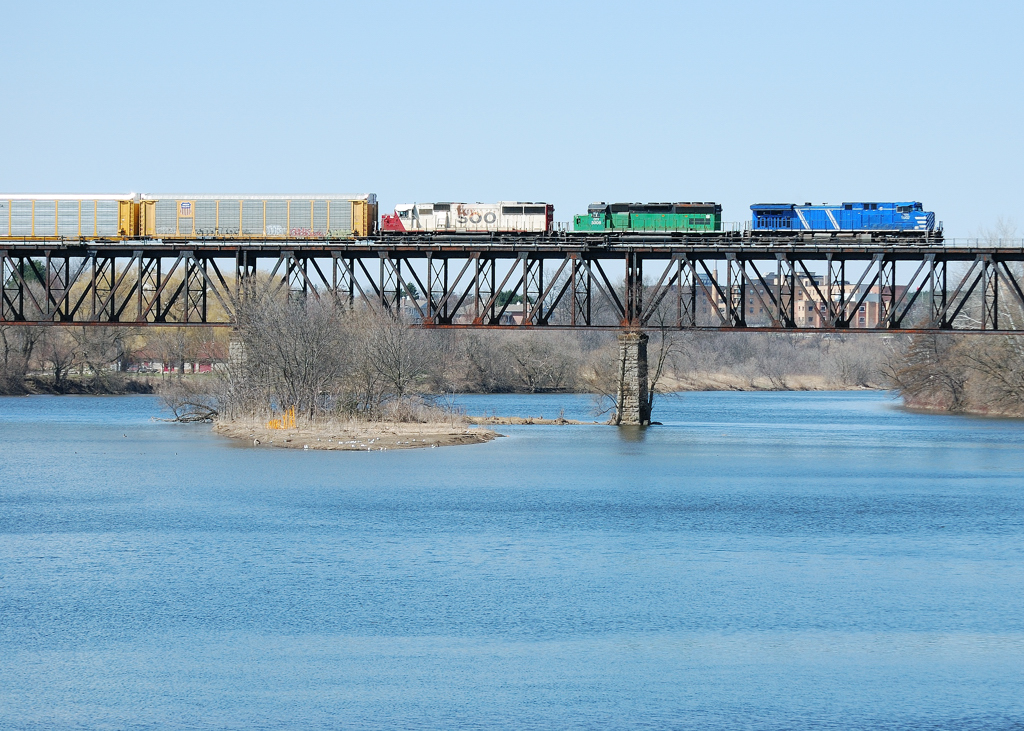 CP 244 makes it way over the Grand River with a colourful lashup