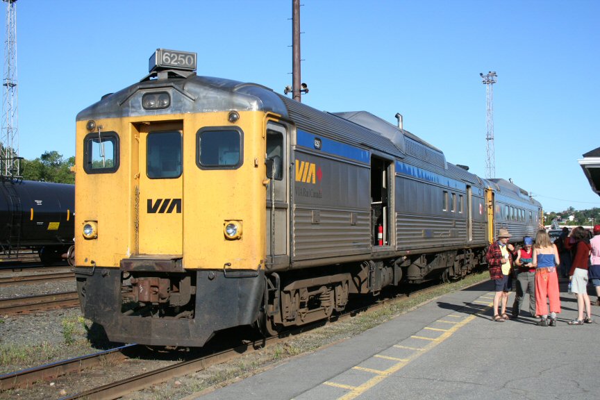 VIA 185, the Sudbury-White River local passenger train, loads passengers and baggage at Sudbury.