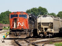 CN 396 with CN 5716 - IC 1010 are setting off flyash hoppers in the Brantford Yard.