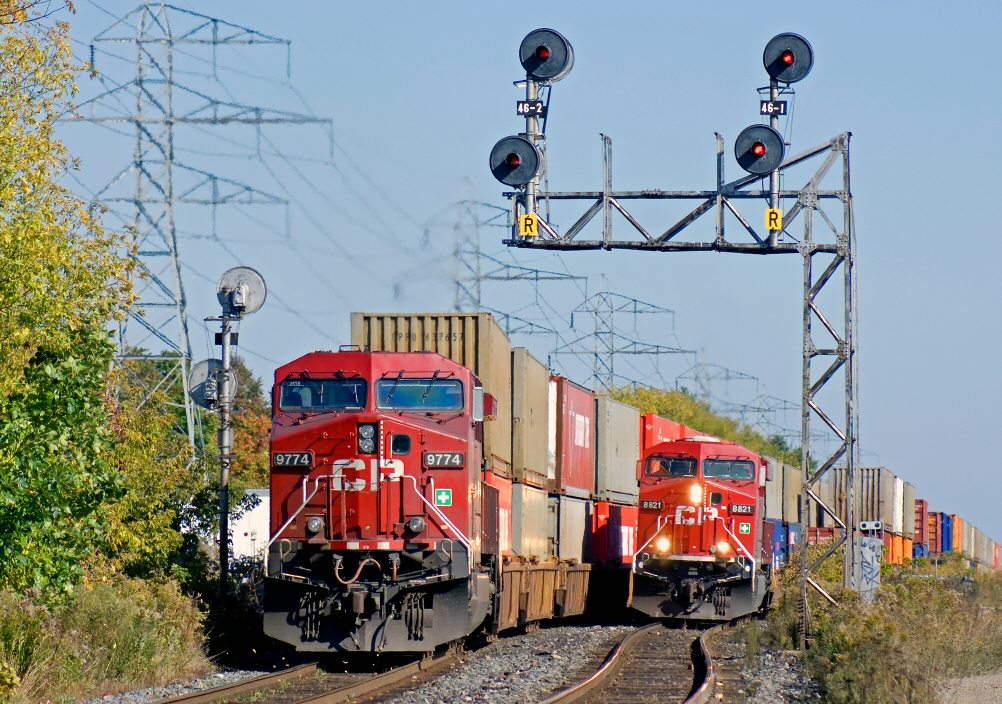 MEET ! Two counterpart trains, tail end remote of 112, head end unit of 113 meet on the busy North Toronto Subdivision.