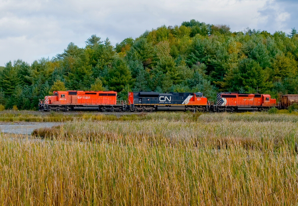 A rare visitor to Canadian Pacific\'s ribbon of steel but a regular visitor to Southern Ontario, CN 8011 lends a hand repaying HPH back to CP on train 223 to Thunder Bay.