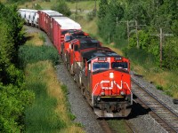 An all CN consist leads an eastbound CP manifest on CP's Galt Sub.