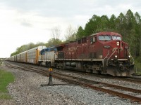 CP 141 rolls through the Jct with 9520 leading D&H 7304