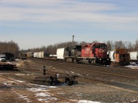 CP 6003 East with the help of  thoroughbred NS 7512 haul their 240 through Guelph Jct on the North track. 