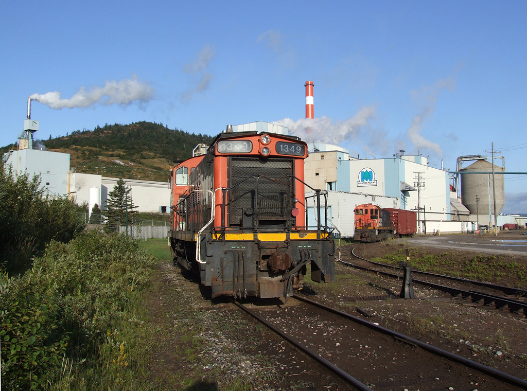 CANX 1349 & CANX 8700 pose outside of the Marathon mill on a beautiful summer morning