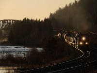 CP 223-03 rumbles westward on the north track of the Kaministiquia Subdivision at sunrise. Leading the freight are CP 8634 and CP 6075.