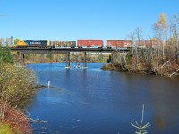 The Northbound Englehart to North Bay Freight makes its way across this scenic Northern Ontario River. 