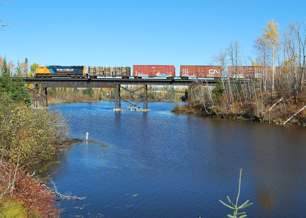 The Northbound Englehart to North Bay Freight makes its way across this scenic Northern Ontario River.