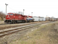 A CP Gevo and an ex BC Rail sd 40-2 haul an eastbound freight through Galt