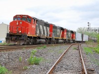 CN X411 with a trio of GP 40-2\'s makes its way past Brant Jct and the Burford Spur connection. 