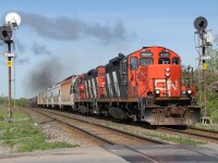 CN L51831 21 passes mile 213.5 of the Kingston Subdivision at Shannonville Road with a short train destined for Queens/Kingston to service a customer.