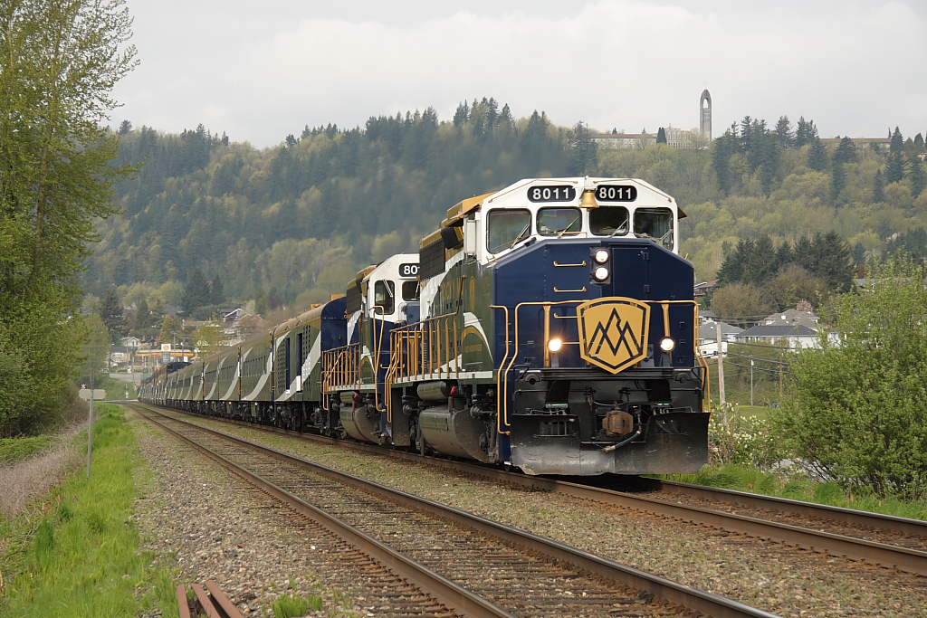 Train P610-51-09 led by the RMRX 8011 hustles a newly painted trainset eastbound through Hatzic on CP\'s Cascade Sub. This is the first train of the 2011 season painted entirely in the new paint.