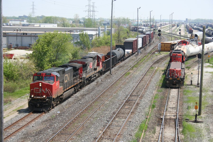 Sarnia Derailment: CN 393 rolls past the scene of a collision between two remote control yard jobs in Sarnia.