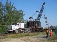 CN Brandt truck pulling the Hoist to spot material and MSR panels for a new switch at Longlac West