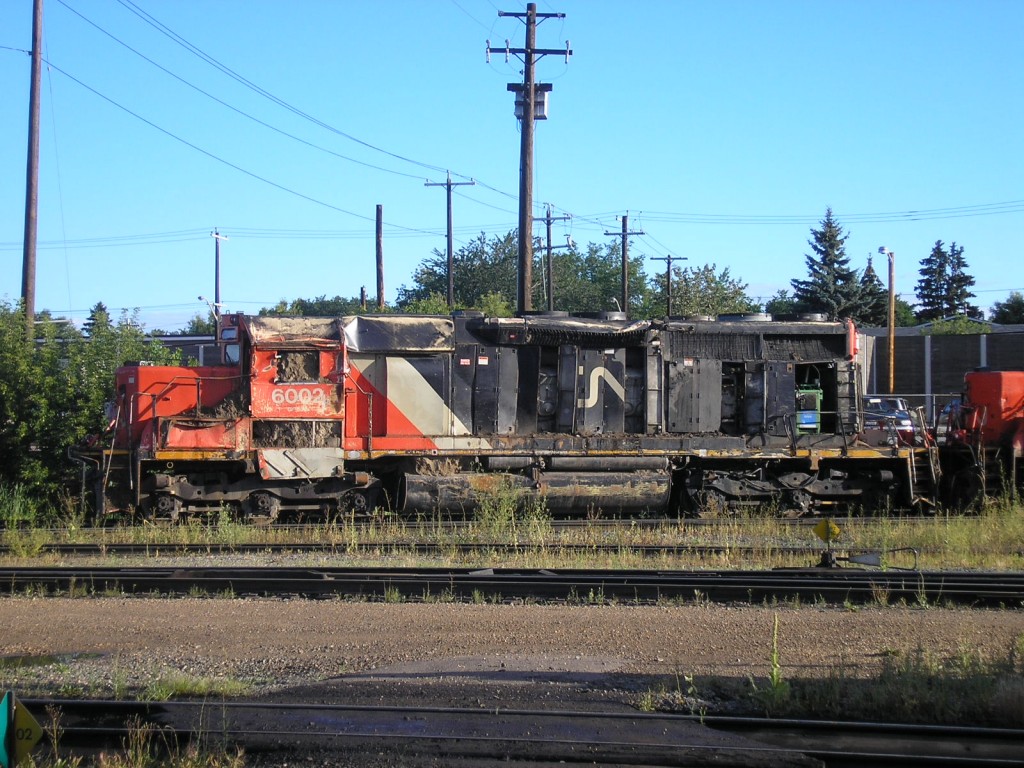 Wrecked unit CN 6002 behind the Walker LRC in Edmonton