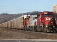 CP 424 crosses Main Street in Milton with CP 5990, CITX 3098, CP 5871