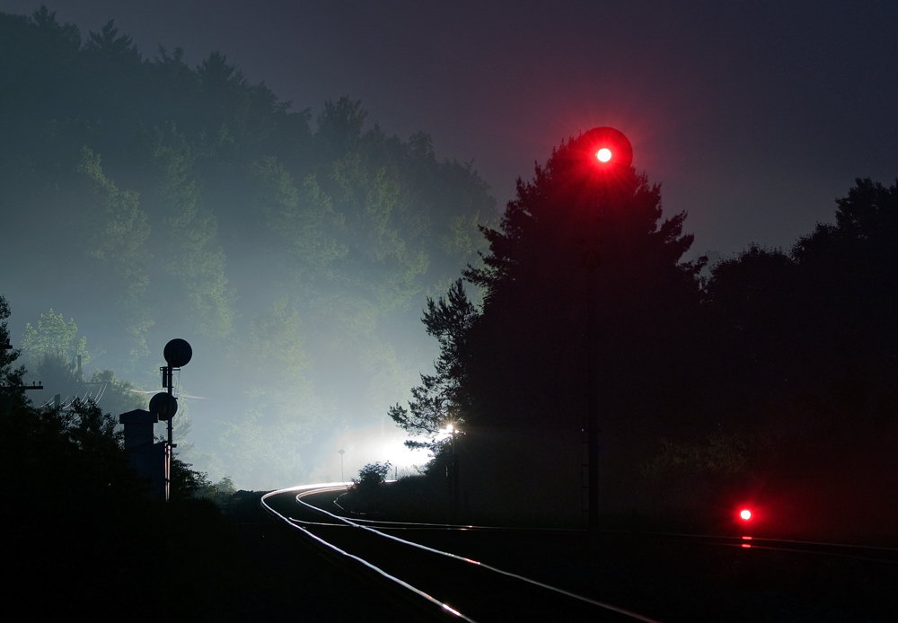 CP 6013 North is seen approaching the south siding switch Palgrave to clear the main track for the CP 8540 South which is by mileboard Spence on this warm spring evening.