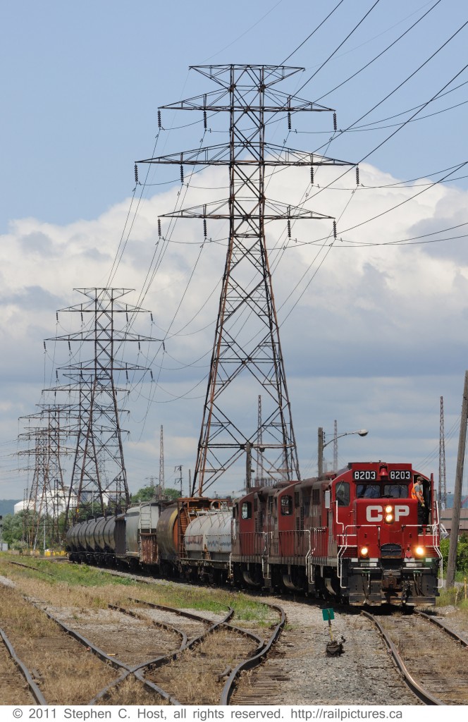 Canadian Pacific Railway Kinnear yard job is in North Hamilton on former Toronto Hamilton and Buffalo (TH&B) tracks about to leave cars at the SOR (CN) / CP Interchange.