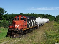 CN 595, CN 4136 South pulls 3 loads into Longford for Stephan Canada, who have 7 empties spotted on the main ready to head North. The name of it escapes me, but this company requires a special chemical that is too lethal to be trucked on the highways, and is the only reason the Newmarket sub is still barely alive between Mile 93 and Mile 98.6, Stephan is serviced twice a week by train L59531 based out of Huntsville, 60 miles North of here