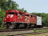 CP SD40M-2 5499 looks better than any of the other dual flag locomotives on the system today, and is in the right position as train 220-16 screams through Bala with a lift at Medonte, and a meet at Craighurst