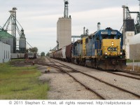 CSXT 2690 on train D724 is on the former siding of the No. 1 Subdivision at Blenheim, Ontario lifting grain traffic. The train originated earlier that day in Chatham, Ontario, and will run to Sarnia to complete a round trip servicing the Agricultural industries of Southwestern Ontario. This line has since been sold to CN.