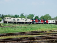 8 semi bulit Ferromex sd 70 aces sit in the Stratford Yard awaiting to be returned to GM London. These new units had been stored in Stratford due to an impeding strike at GM London.