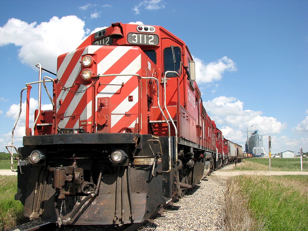 CP GP38-2 3112 brings CP P34 from Brandon to Redvers Viterra. CP 3112 is now in the Canadian Pacific red scheme and this line is possibly changing owners or been abandoned.