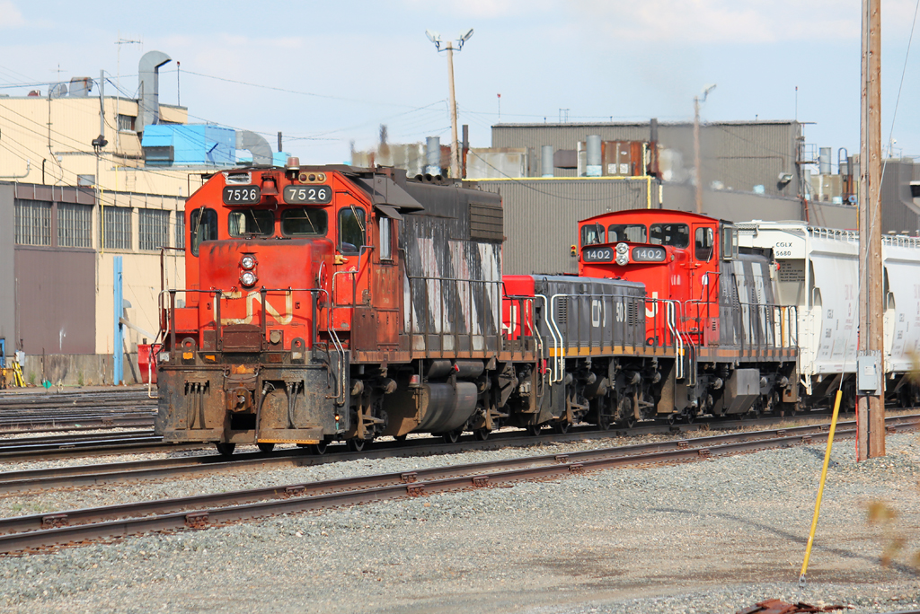 Remote\'d Edmonton Yard power lead by CN 7526.