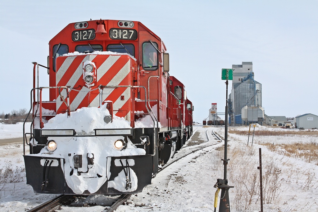 CP 3127 and two others sit and wait for the cars to be loaded and for a fresh crew out of Brandon.