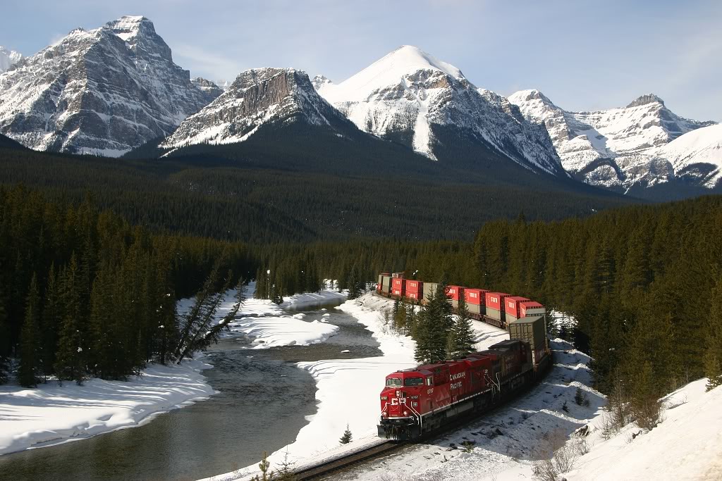 CP 8767 rolls through Morants Curve on the banks of the Bow River.