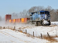 Racing east at the west end of Port Hope siding, CEFX 1040 on point, CP 9589 has the tail. 1414hrs.