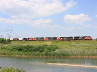 With an ex-BNSF Dash 8 with in the lash up CN 8922, CN 5611, CN 2576, CN 5723, CN 2170 lead 148 as it works B.I.T.