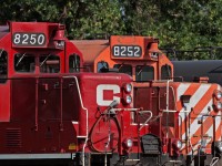 Two sisters of different paint schemes lay over at Lambton Yard awaiting there next assignments, CP 8250 (ex 1572), 8251(ex 1616, not shown) and 8252 (ex 1619) were already rebuilt into yard units back in the eighties for yard service only but retained transition, then renumbered into the 8200 series for road service when the demand for yard locomotives decreased. 