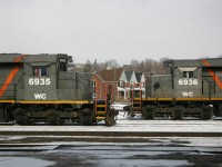 A pair of WC SD40-3's both on CN 148 idle in the Brantford Yard as they set off a BNSF unit for CN 399