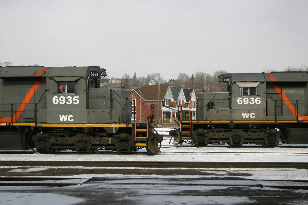 A pair of WC SD40-3\'s both on CN 148 idle in the Brantford Yard as they set off a BNSF unit for CN 399