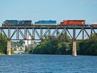 After waiting for almost 3 hrs while CP 240 set off a re ouccuring hot box, the sun nicely came around to be able to shoot 240 as it made its way across the Grand River with CEFX 1028+SLRG(BL2) 52+ CP 6021. 