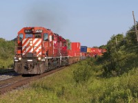 CP 230 appears around the bend at Lovekin, ON with two classic GMD products leading.