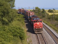 A C44-9WL locomotive leads a CN westbound thru Lovekin.