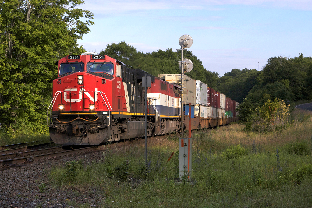 CN ES44DC 2251 leads Q10721 16 past NSS Dock Siding with a clearance from Boyne to St. Cloud.