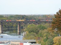 CN SD50F 5449 leads an eastbound train with six units through Paris, Ontario on a beautiful fall afternoon. All of CN\'s SD50F\'s would be retired in the coming months ahead.