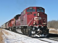 CP 450 with CP 9303 and 5957 pull a short manifest into the siding at Red Jacket for a meet with 105 in the winter of 08. 